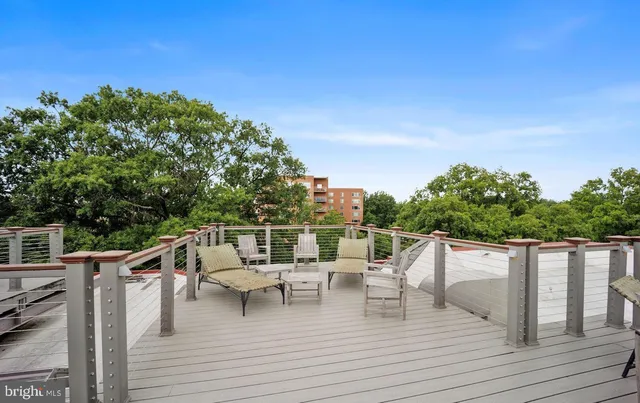 a view of roof deck with patio