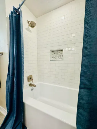 a bathroom with a bathtub