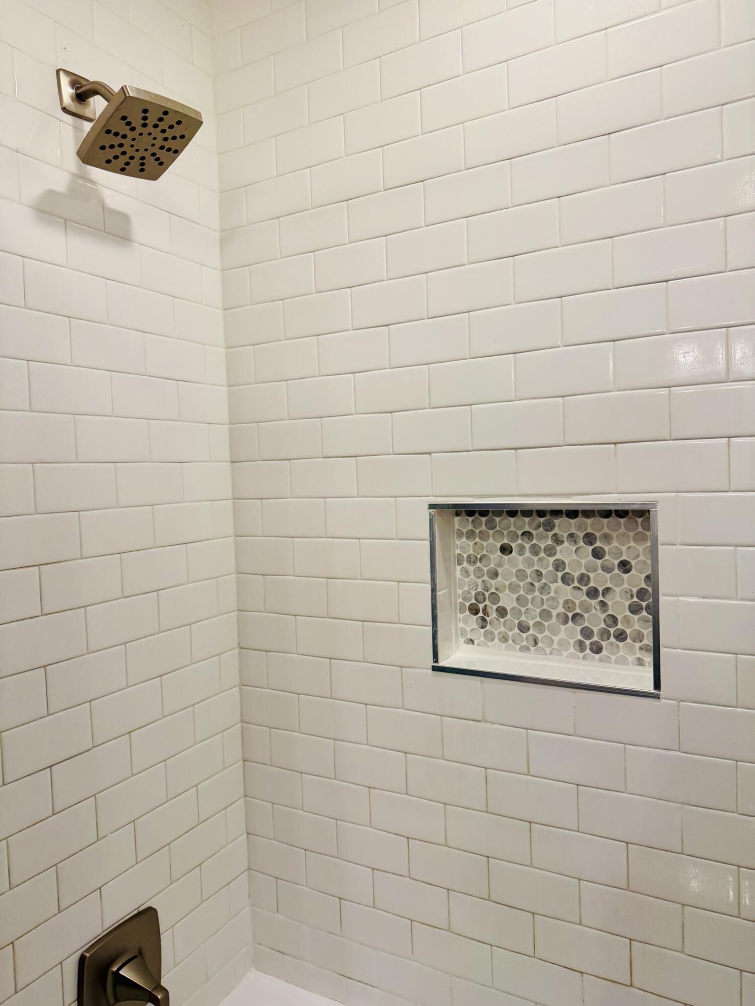 2509 30th Street Lubbock, TX 79410 - Photo 13 of 26 a bathroom with a shower