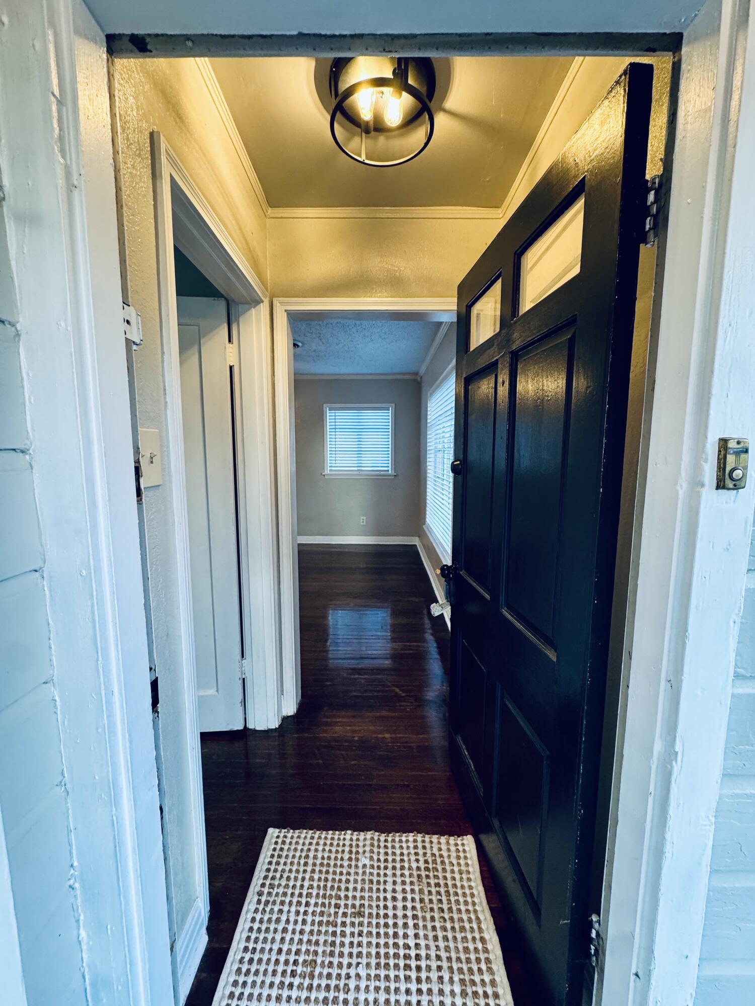 2509 30th Street Lubbock, TX 79410 - Photo 22 of 31 a bathroom with a sink and a mirror