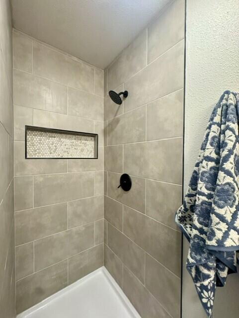 2509 30th Street Lubbock, TX 79410 - Photo 23 of 31 a bathroom with a shower