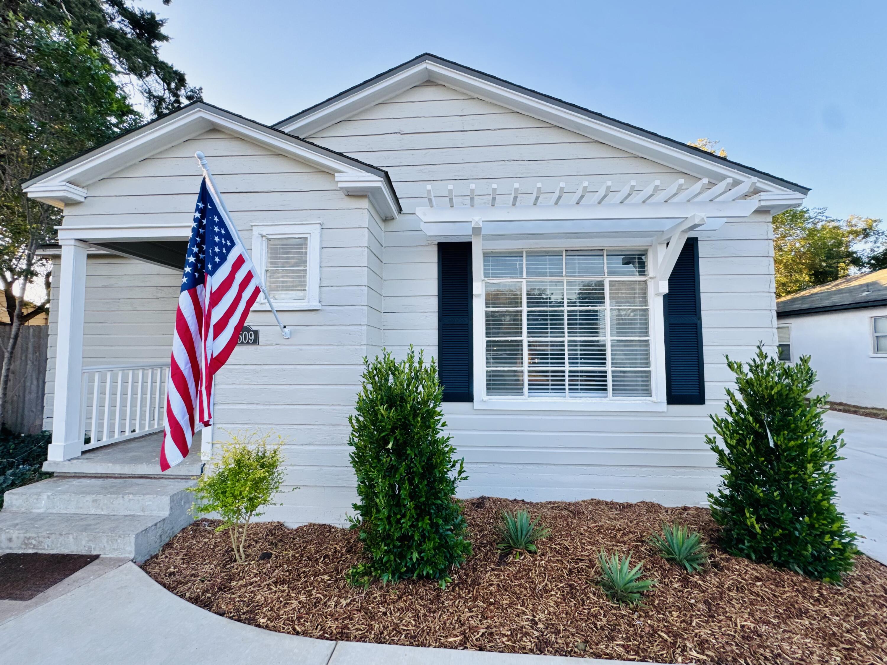 2509 30th Street Lubbock, TX 79410 - Photo 30 of 31 a front view of a house with garden