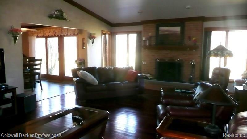 457 Lexington Drive Rochester, MI 48307 - Photo 13 of 34 View #1 Of Great Room With Gas Fireplace And Brazillian Cherry Hardwood Floors!