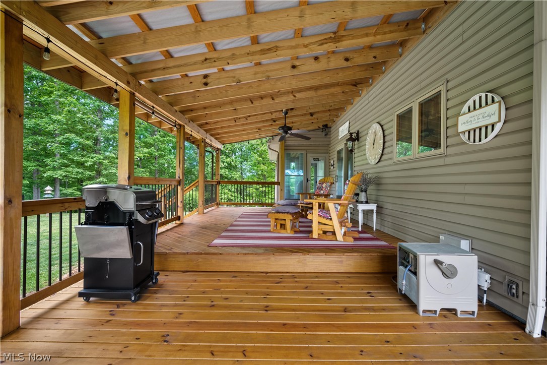 314 Three Bridges Road Palestine, WV 26160 - Photo 12 of 35 Amazing covered back deck