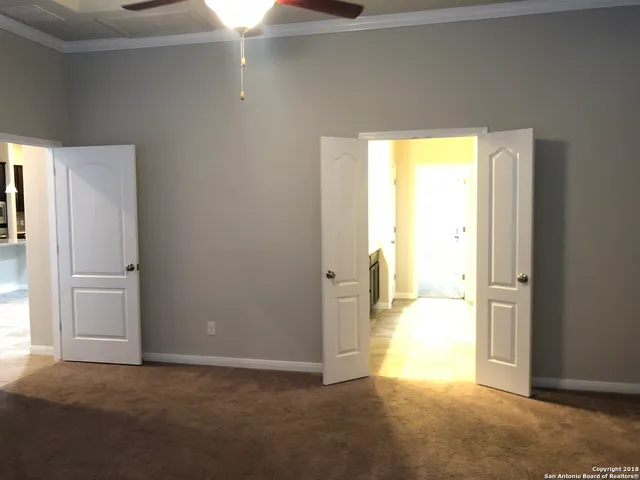 a view of an empty room with a gallery