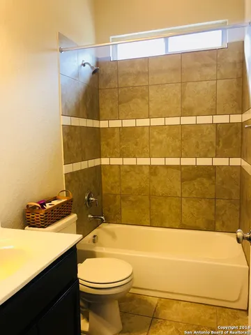 a bathroom with a sink and bathtub