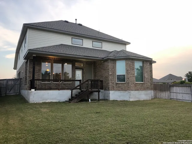 a front view of house with outdoor space