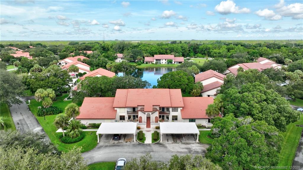 3460 Southeast Martinique Trace, Unit 103 Stuart, FL 34997 - Photo 30 of 42 an aerial view of multiple house