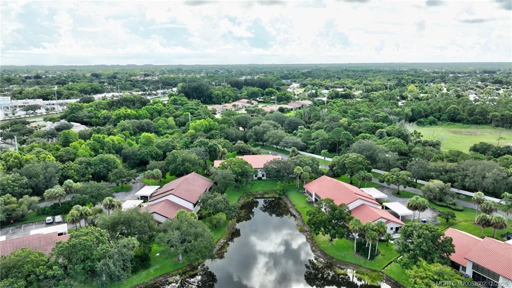 3460 Southeast Martinique Trace, Unit 103 Stuart, FL 34997 - Photo 38 of 42 an aerial view of a city