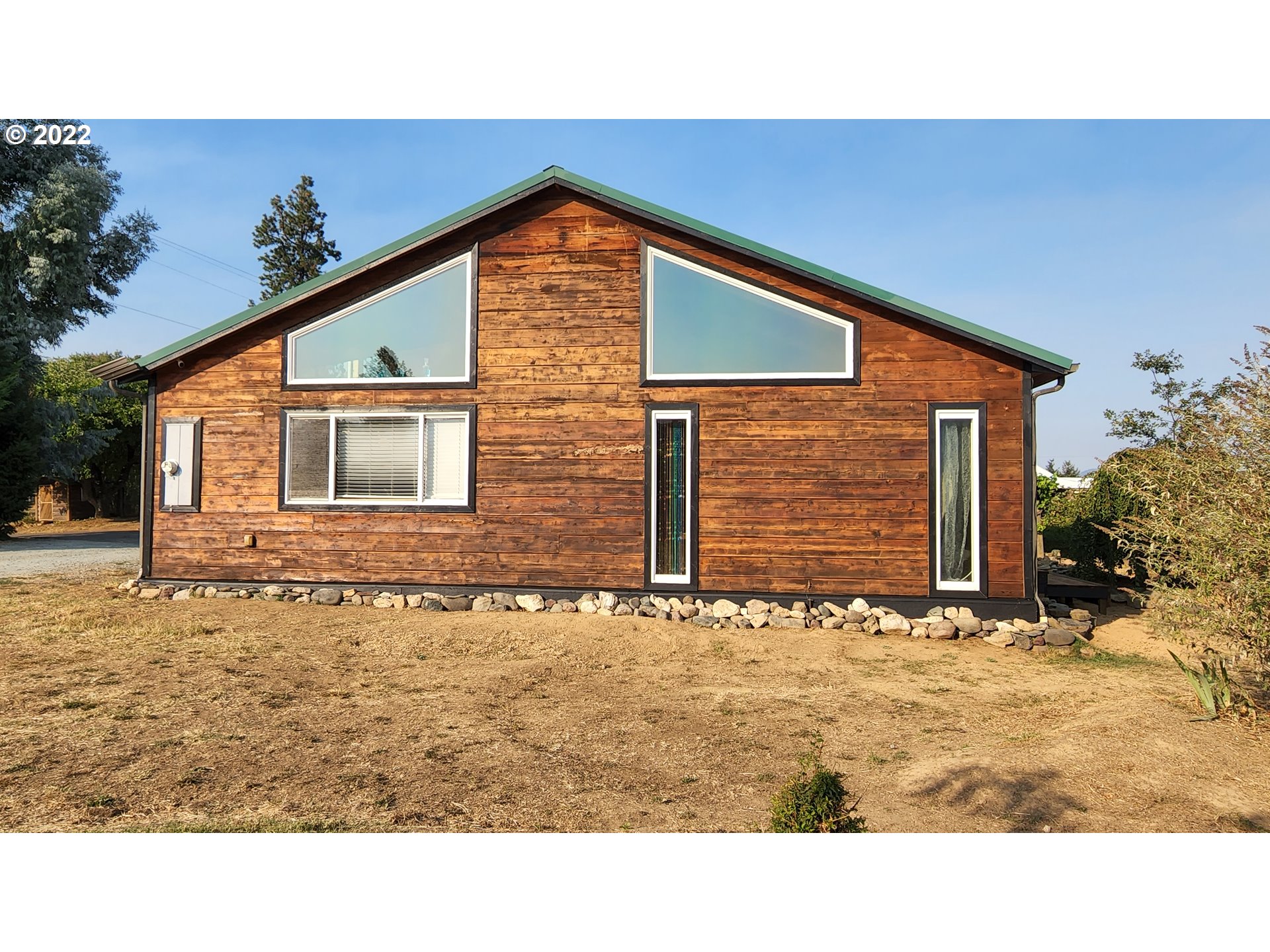 5208 Riddle Bypass Road Riddle, OR 97469 - Photo 2 of 37 a black and white photo of a house