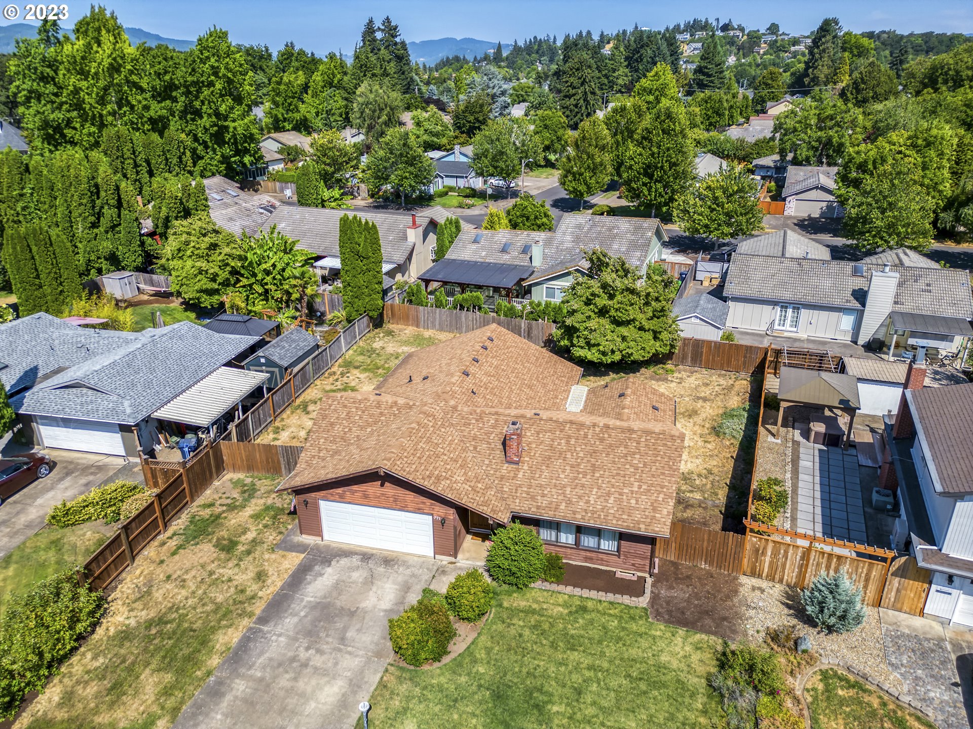 771 Rowan Avenue Springfield, OR 97477 - Photo 34 of 37 an aerial view of a house with garden space and street view
