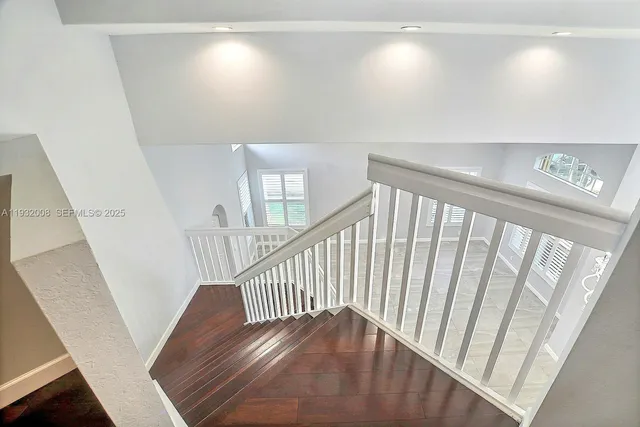 a view of a livingroom with wooden floor
