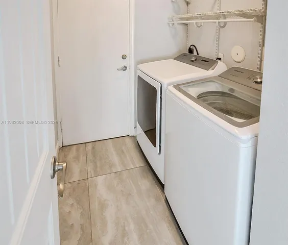 a view of swimming pool with a patio