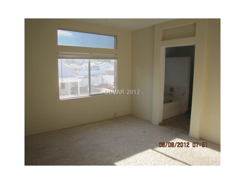 2102 Maple Springs Street Henderson, NV 89002 - Photo 11 of 22 Master Bedroom.