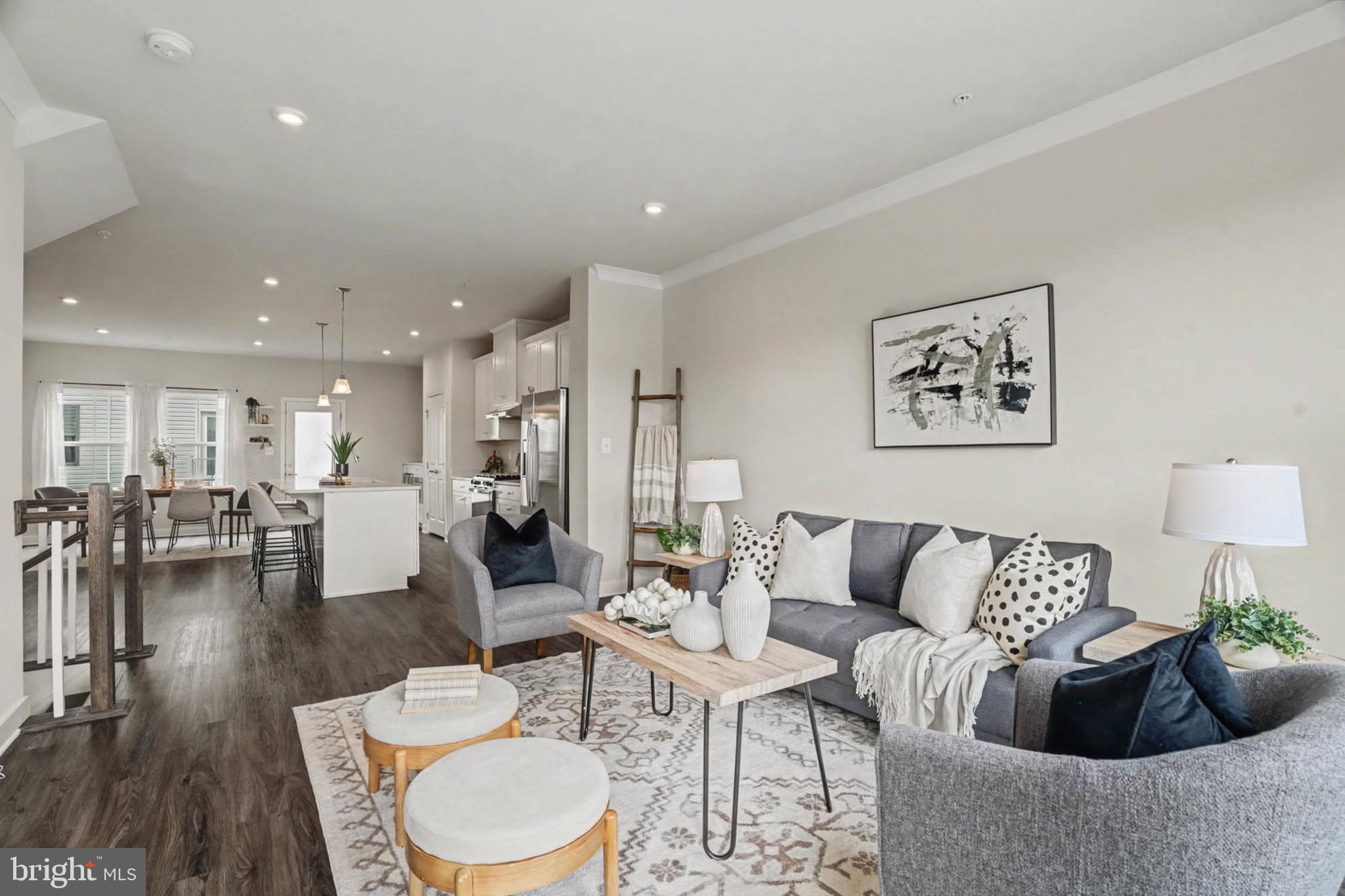 1518 Decatur Street, Unit C Baltimore, MD 21230 - Photo 13 of 42 a living room with furniture and wooden floor