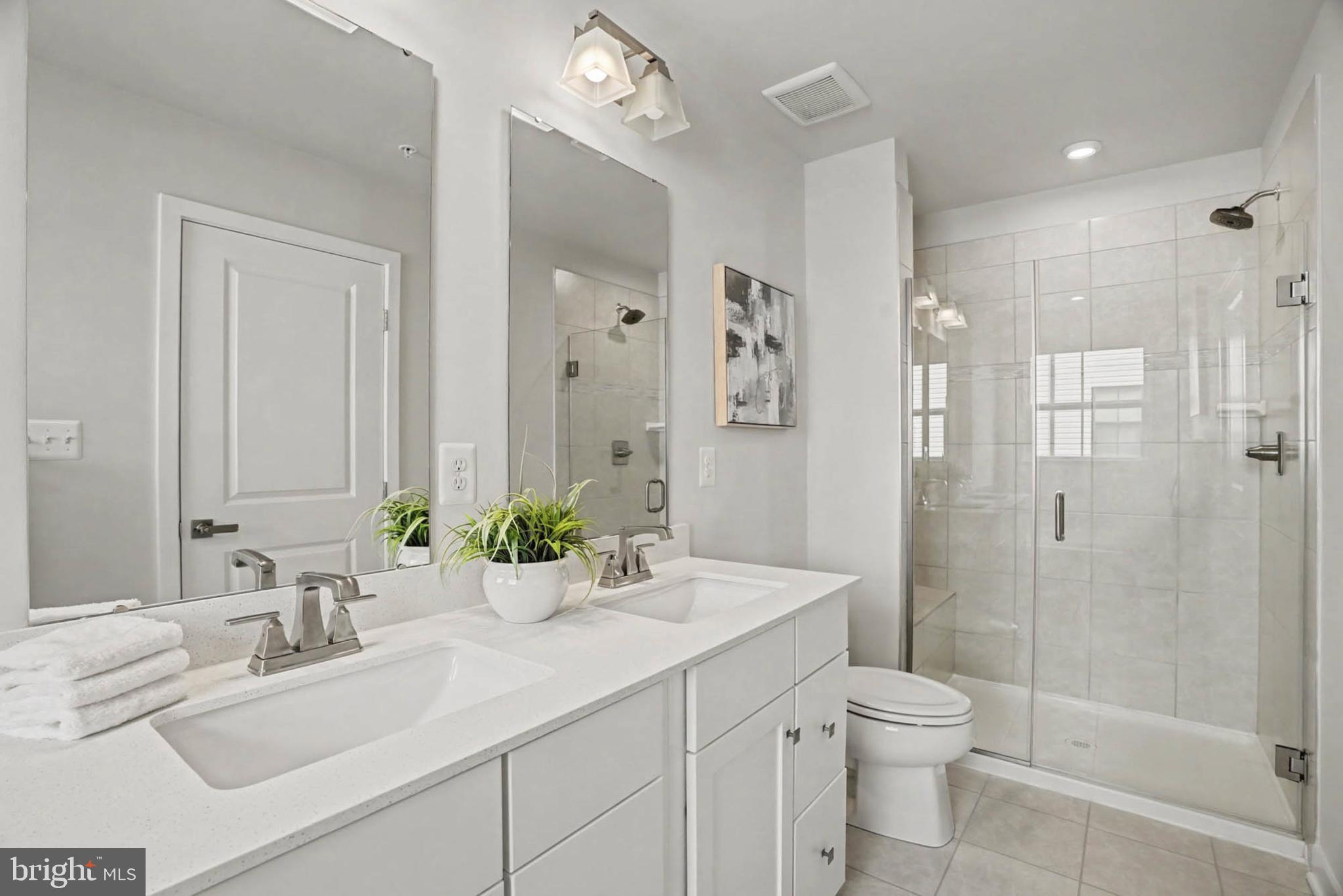 1518 Decatur Street, Unit C Baltimore, MD 21230 - Photo 17 of 42 a bathroom with a sink a toilet and shower