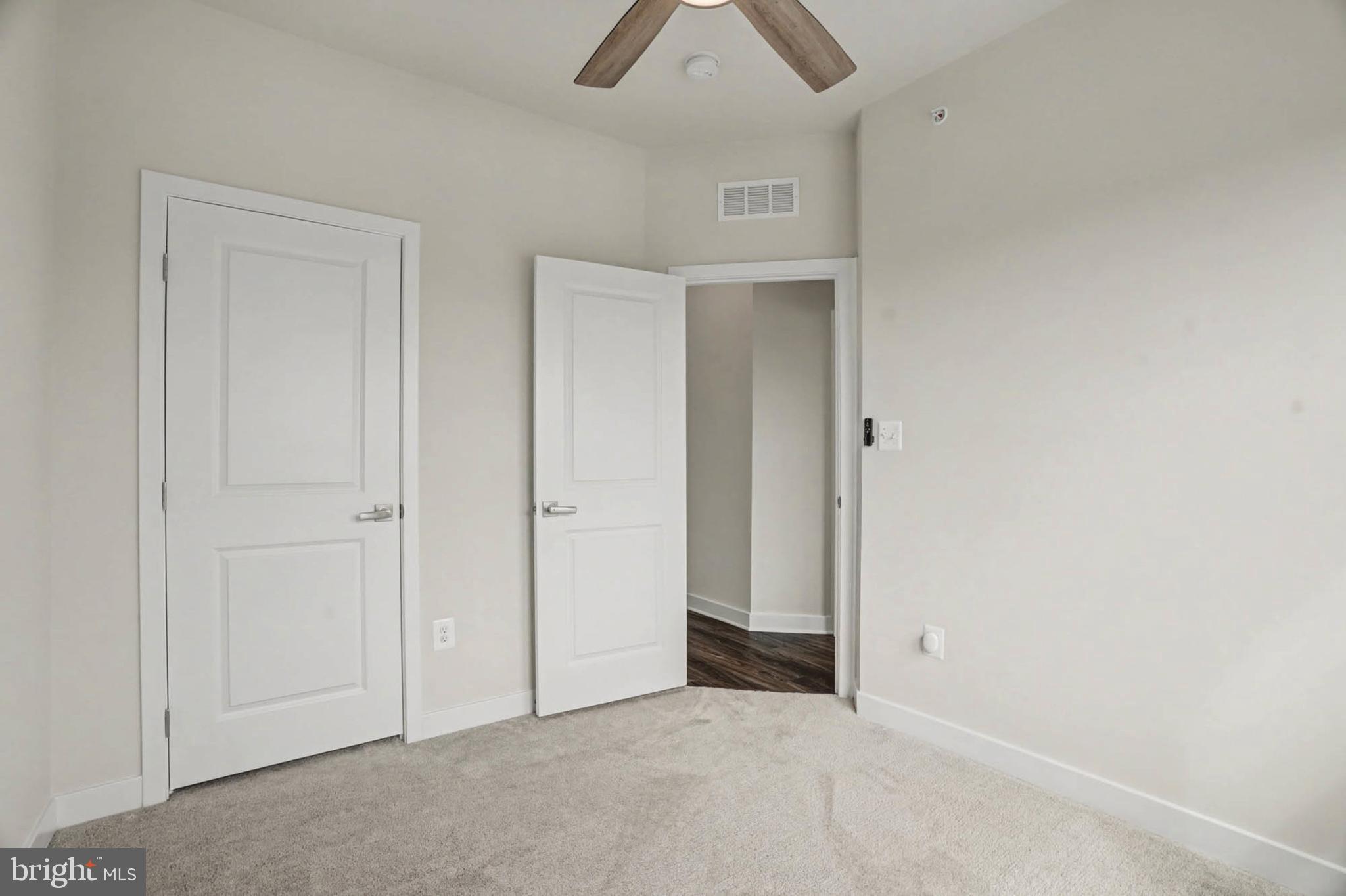 1518 Decatur Street, Unit C Baltimore, MD 21230 - Photo 20 of 42 an empty room with ceiling fan