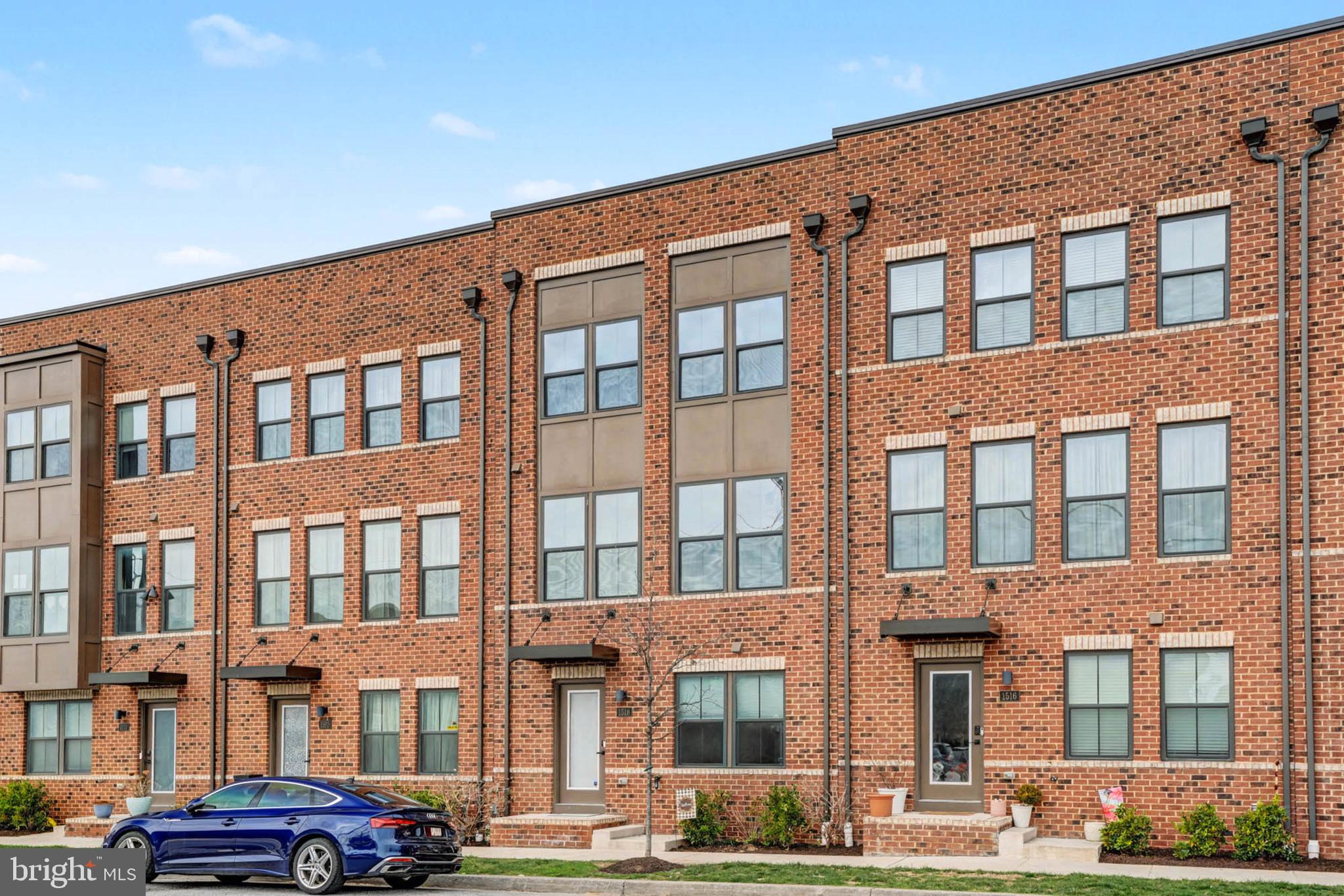 1518 Decatur Street, Unit C Baltimore, MD 21230 - Photo 2 of 42 a front view of a building with lot of windows