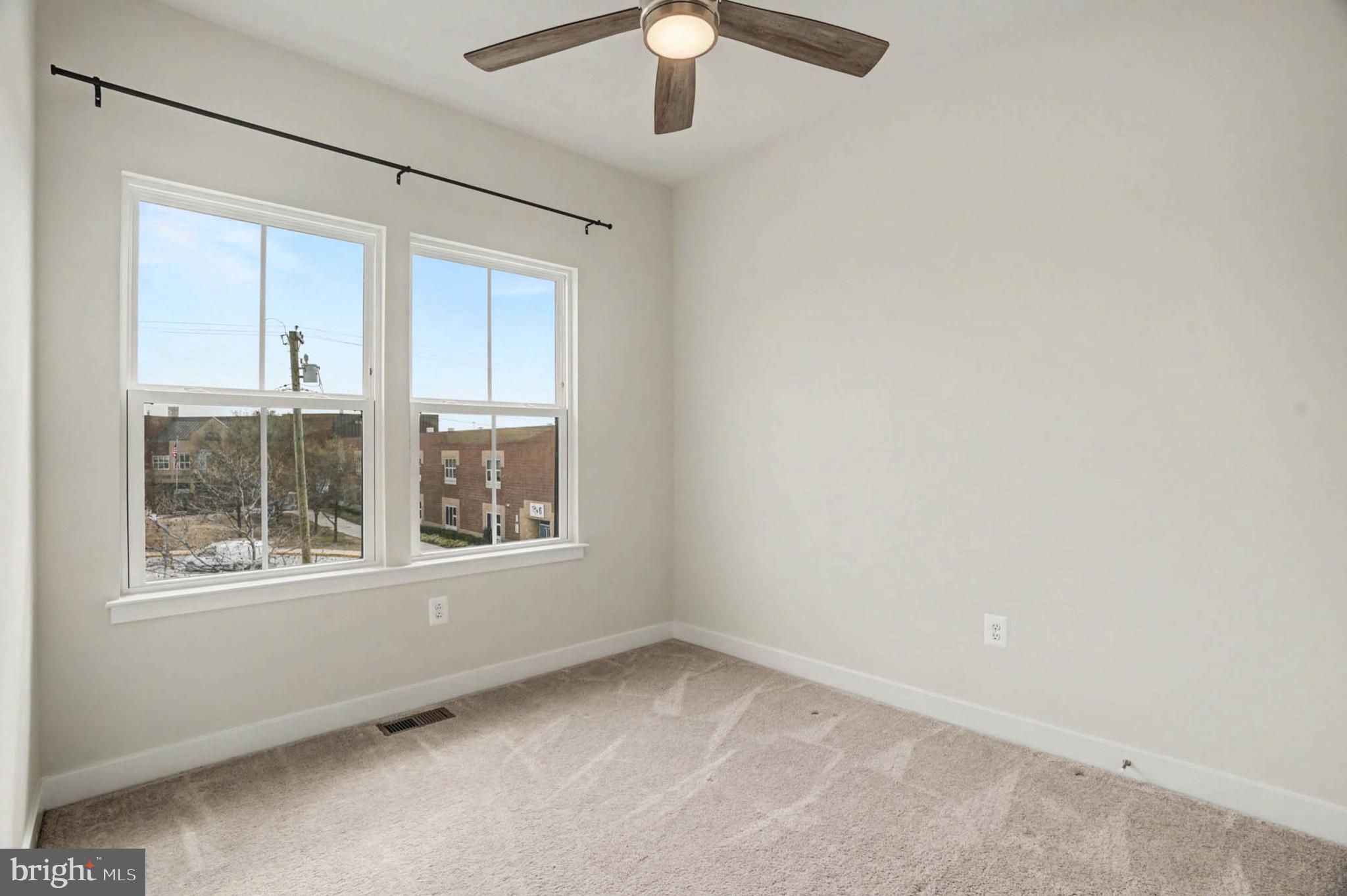 1518 Decatur Street, Unit C Baltimore, MD 21230 - Photo 21 of 42 an empty room with a window