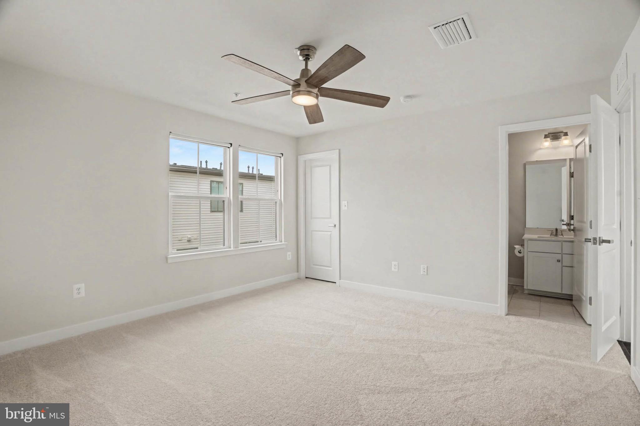 1518 Decatur Street, Unit C Baltimore, MD 21230 - Photo 22 of 42 a view of an empty room with a window