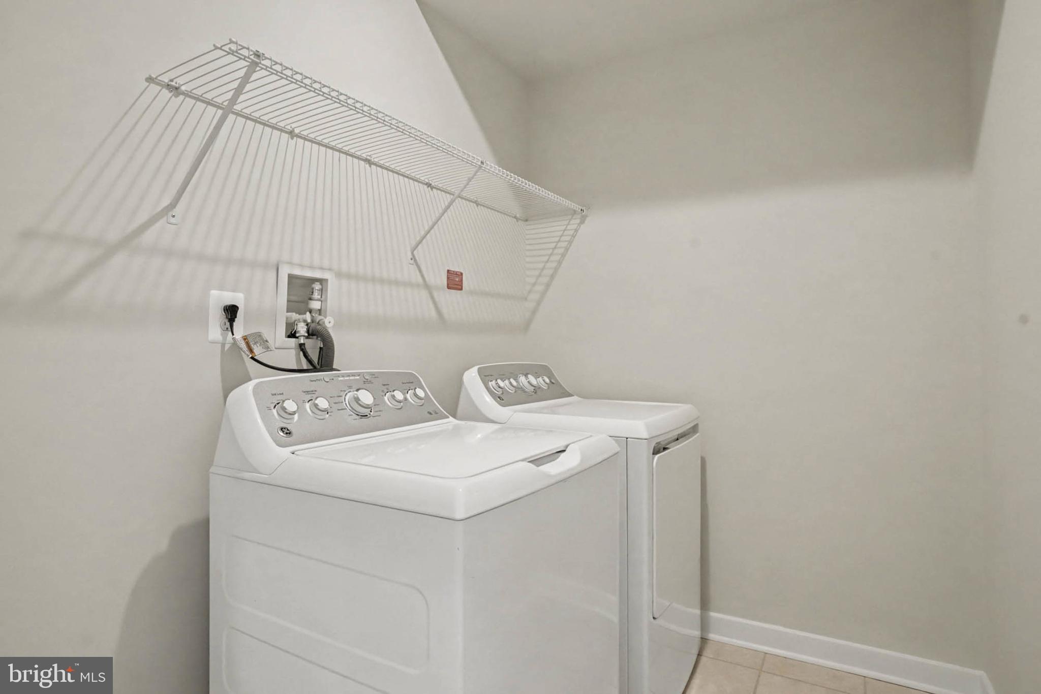 1518 Decatur Street, Unit C Baltimore, MD 21230 - Photo 27 of 42 a utility room with dryer and washer
