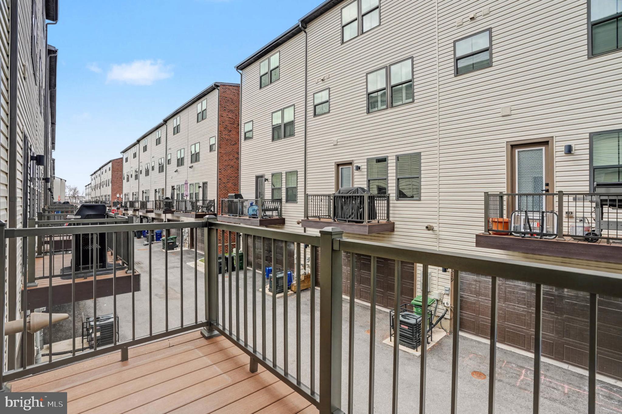 1518 Decatur Street, Unit C Baltimore, MD 21230 - Photo 33 of 42 a view of a brick building from a balcony
