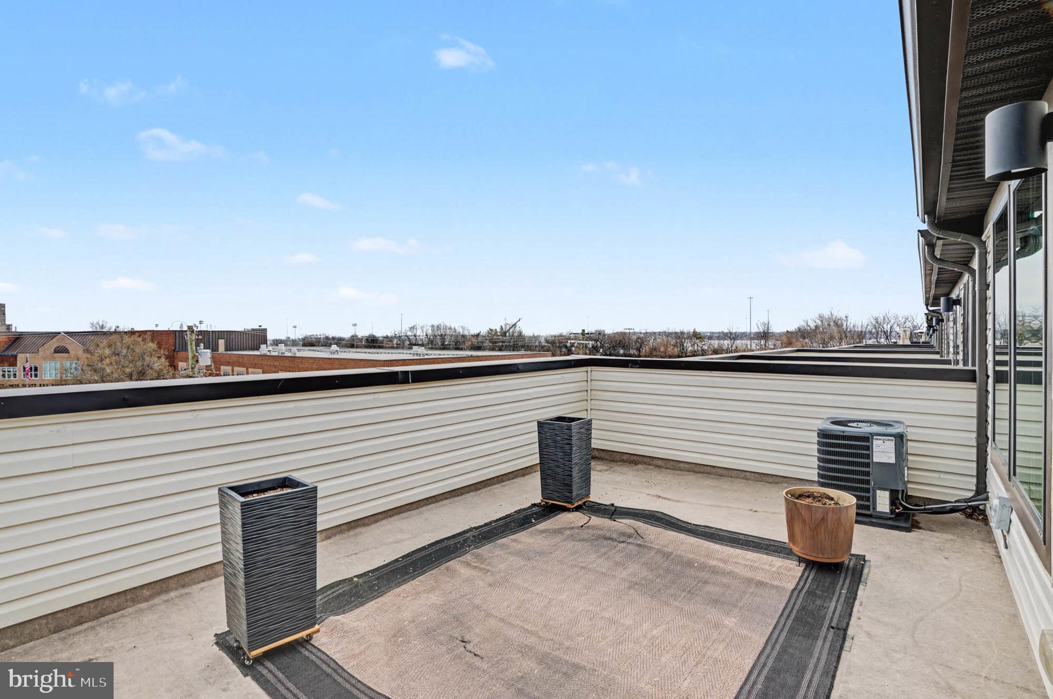 1518 Decatur Street, Unit C Baltimore, MD 21230 - Photo 34 of 42 a view of a terrace with outdoor seating and city view