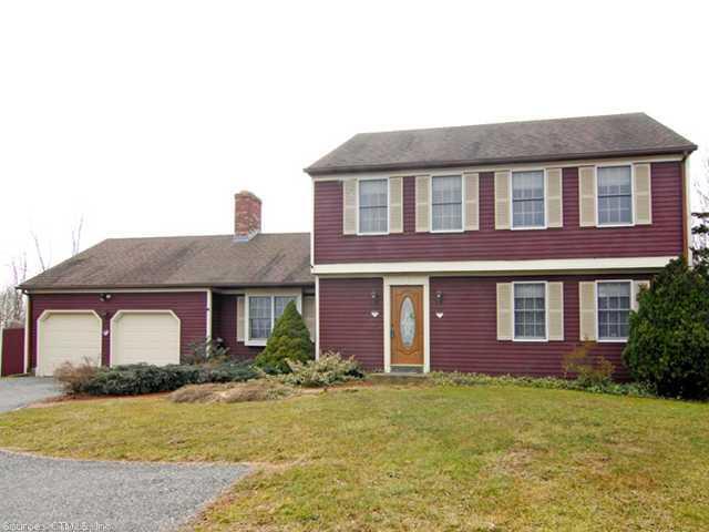 18 Victoria Road Portland, CT 06480 - Photo 1 of 1 a front view of a house with garden