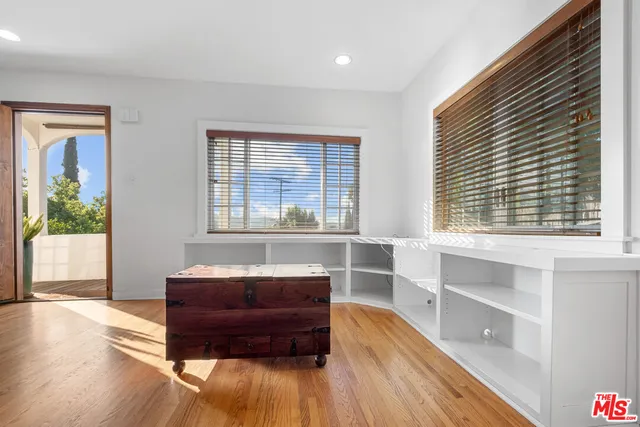 a room with furniture and a window