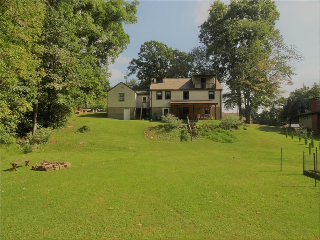 226 Oak Road Pittsburgh, PA 15239 - Photo 2 of 25 The home from near the GIANT shed, the lot is approximately 354' long.