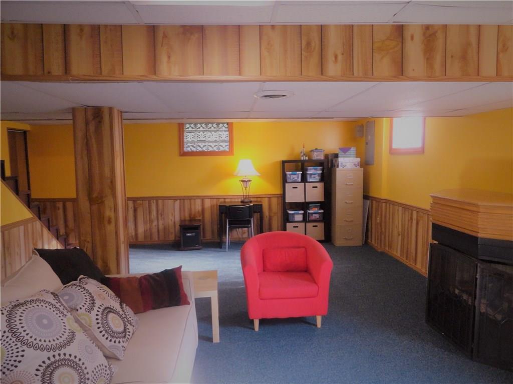 226 Oak Road Pittsburgh, PA 15239 - Photo 17 of 25 On the lower level is the Giant Game Room, L Shaped. This section approximately 25x13. There are plenty of widows and an exit to the rear yard.
