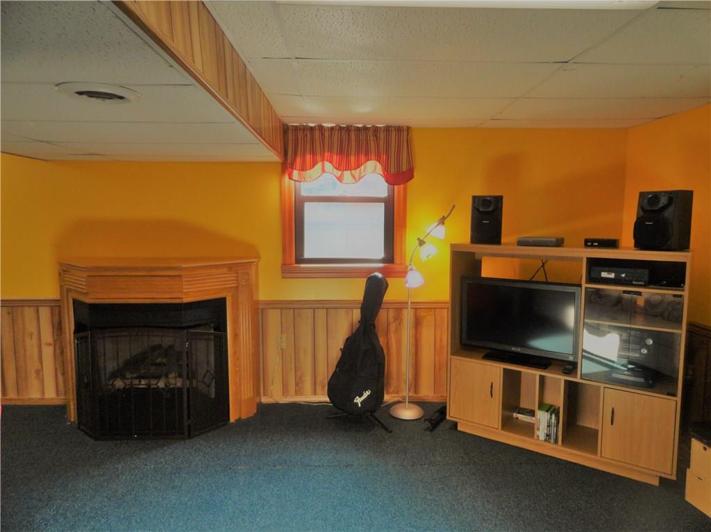 226 Oak Road Pittsburgh, PA 15239 - Photo 18 of 25 Featured in the Giant Game Room a gas fireplace for cozy winter nights.