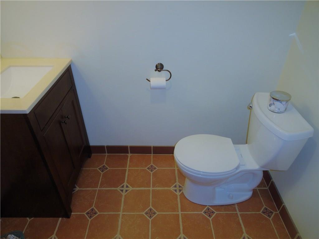 226 Oak Road Pittsburgh, PA 15239 - Photo 20 of 25 This half bath also features updated commode and vanity. It is on the lower level with the Giant Game Room.