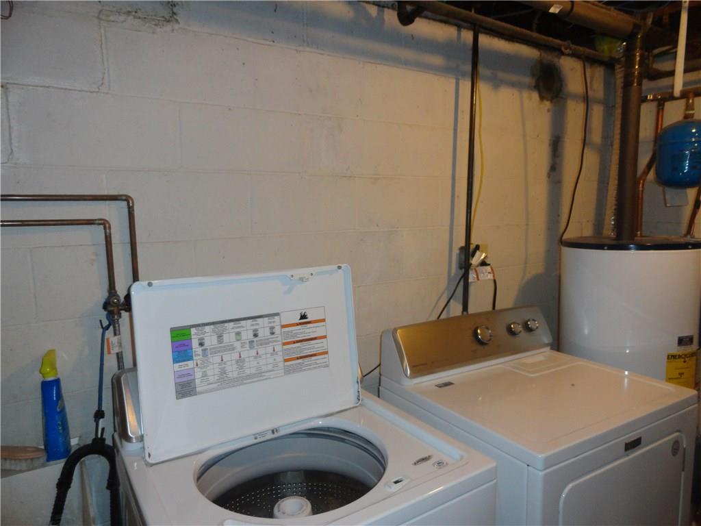 226 Oak Road Pittsburgh, PA 15239 - Photo 21 of 25 The unfinished portion of the lower level is approximately 18'x15' for handy storage. In addition to this storage there is another storage room under the garage nearly 12'x11'.