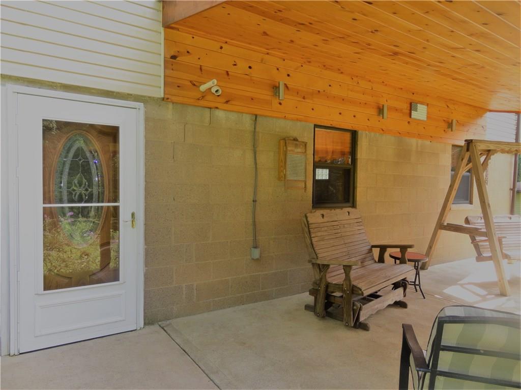 226 Oak Road Pittsburgh, PA 15239 - Photo 23 of 25 Come out of the Giant Game Room to enjoy fresh air and beautiful vistas while relaxing on the rear, covered patio which is approximately 21" long x 11' wide.