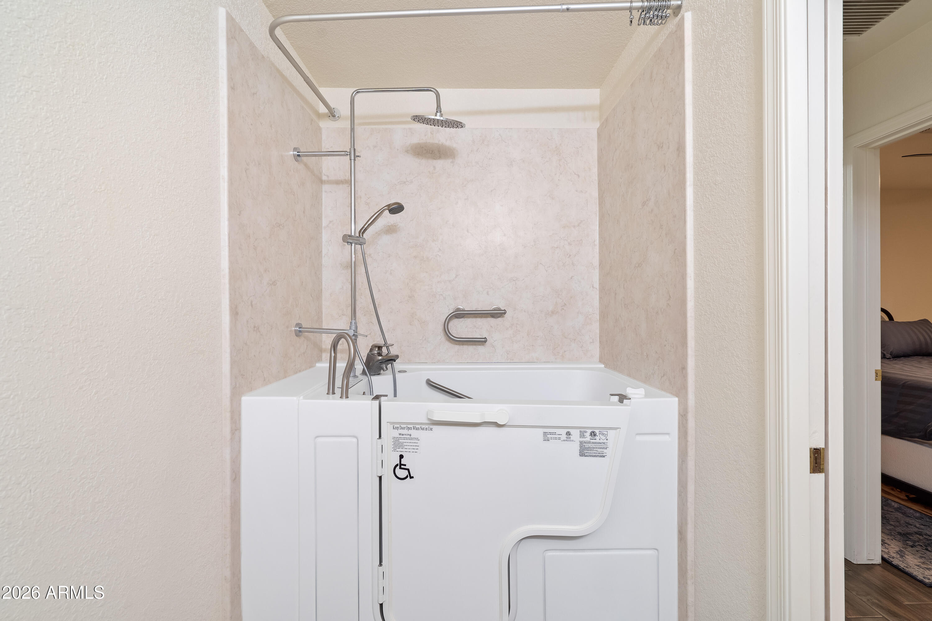 4591 Territorial Loop Sierra Vista, AZ 85635 - Photo 21 of 27 a bathroom with a sink a toilet and shower