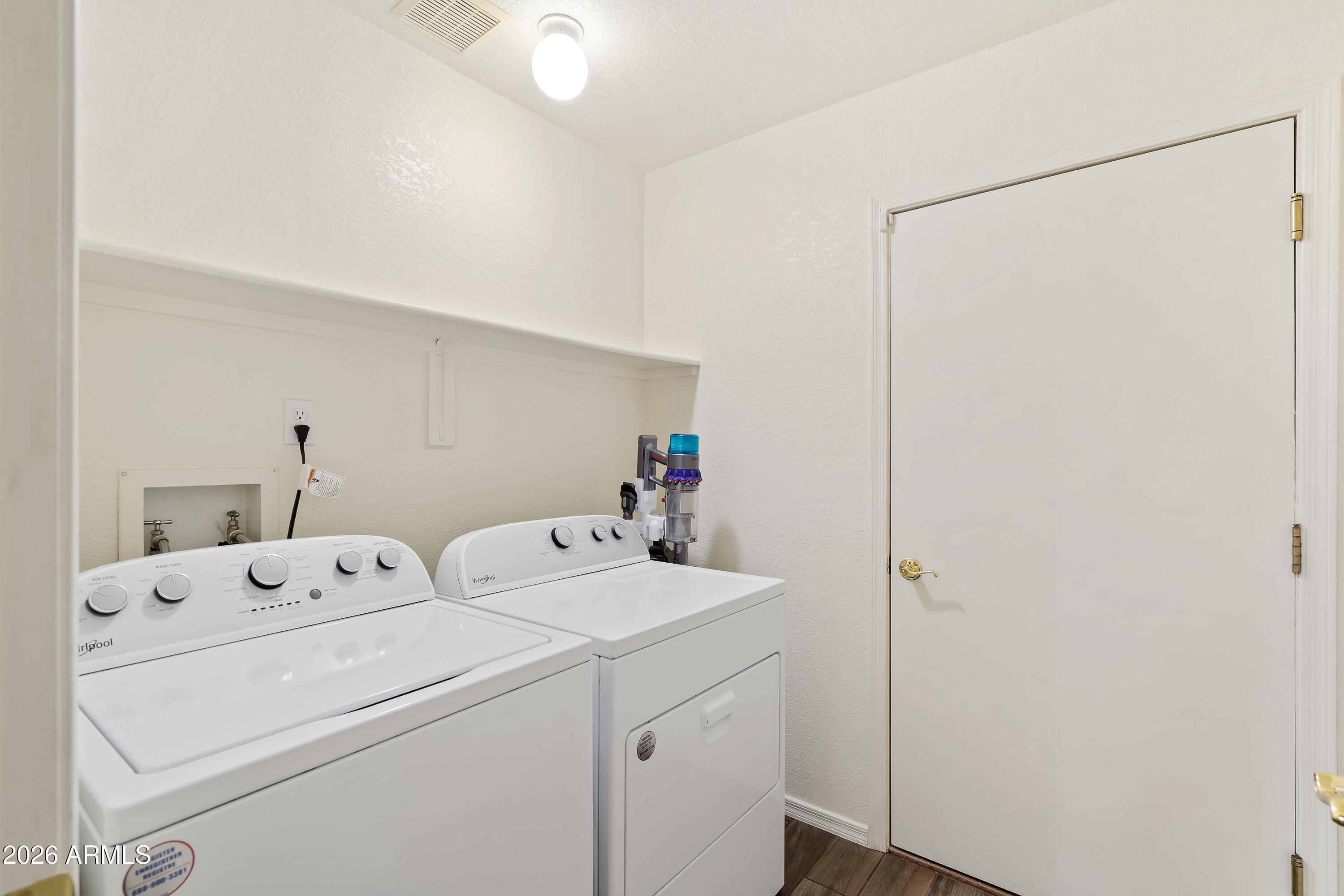 4591 Territorial Loop Sierra Vista, AZ 85635 - Photo 22 of 27 a utility room with dryer and washer