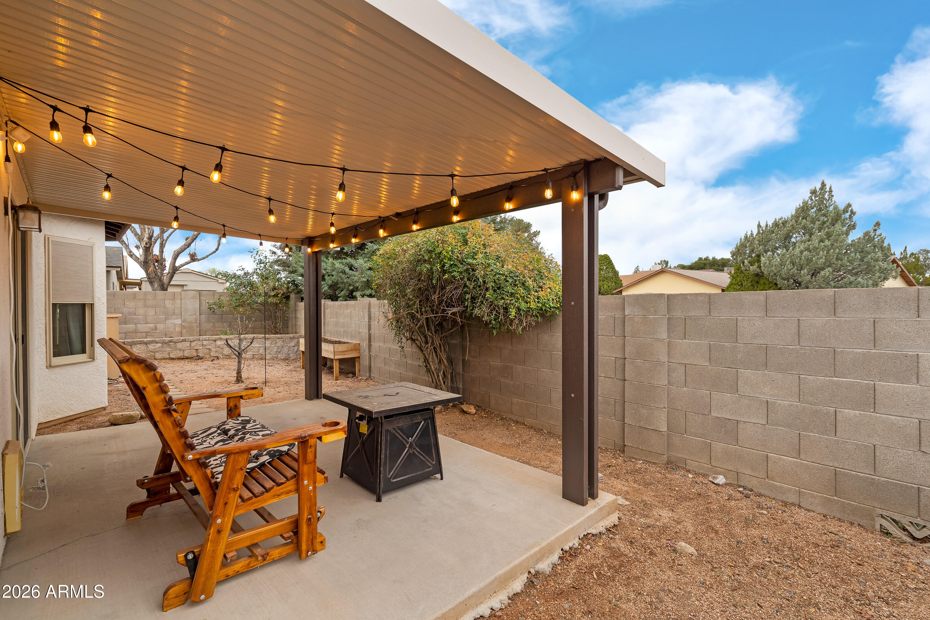 4591 Territorial Loop Sierra Vista, AZ 85635 - Photo 24 of 27 a patio with table and chairs