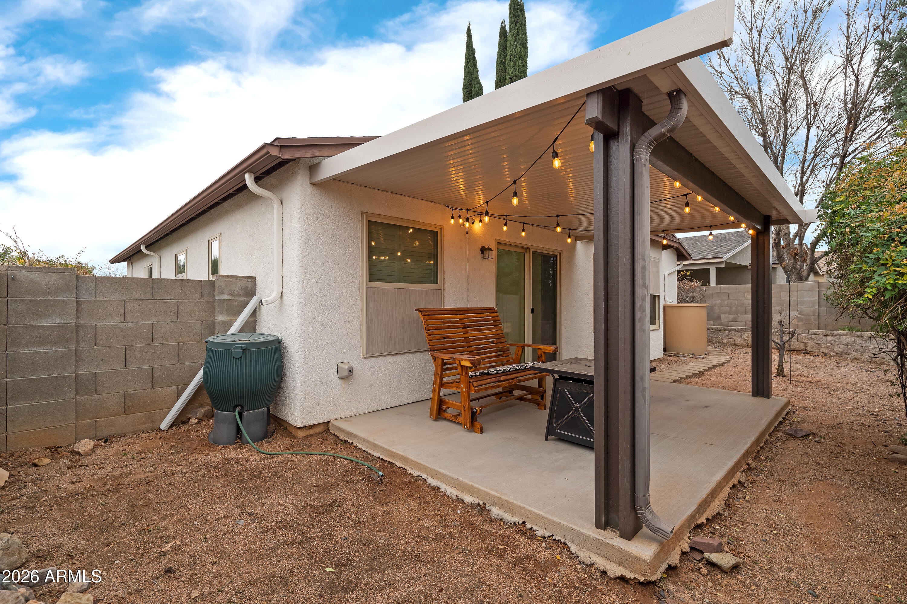 4591 Territorial Loop Sierra Vista, AZ 85635 - Photo 25 of 27 a backyard of a house with outdoor seating