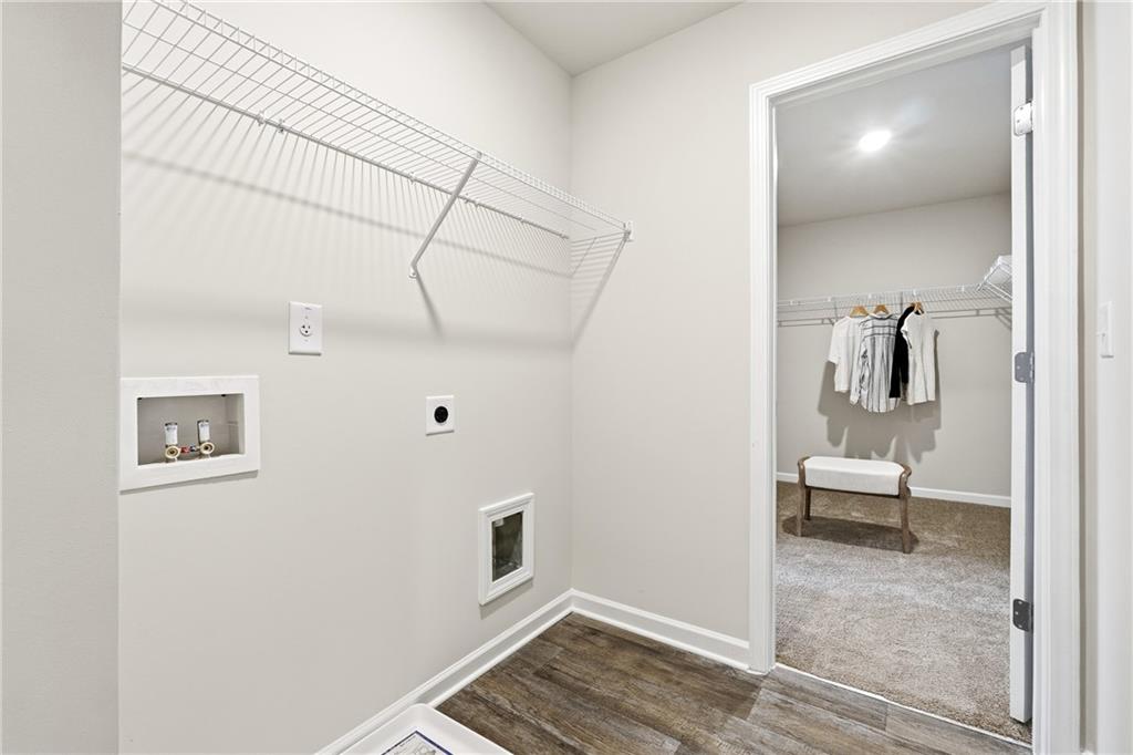 3227 Winding Waters Way, Unit 36 Powder Springs, GA 30127 - Photo 27 of 30 a bathroom with a toilet and a sink