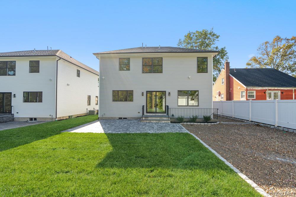 47 Netz Place Albertson, NY 11507 - Photo 36 of 41 Rear view of house featuring a patio
