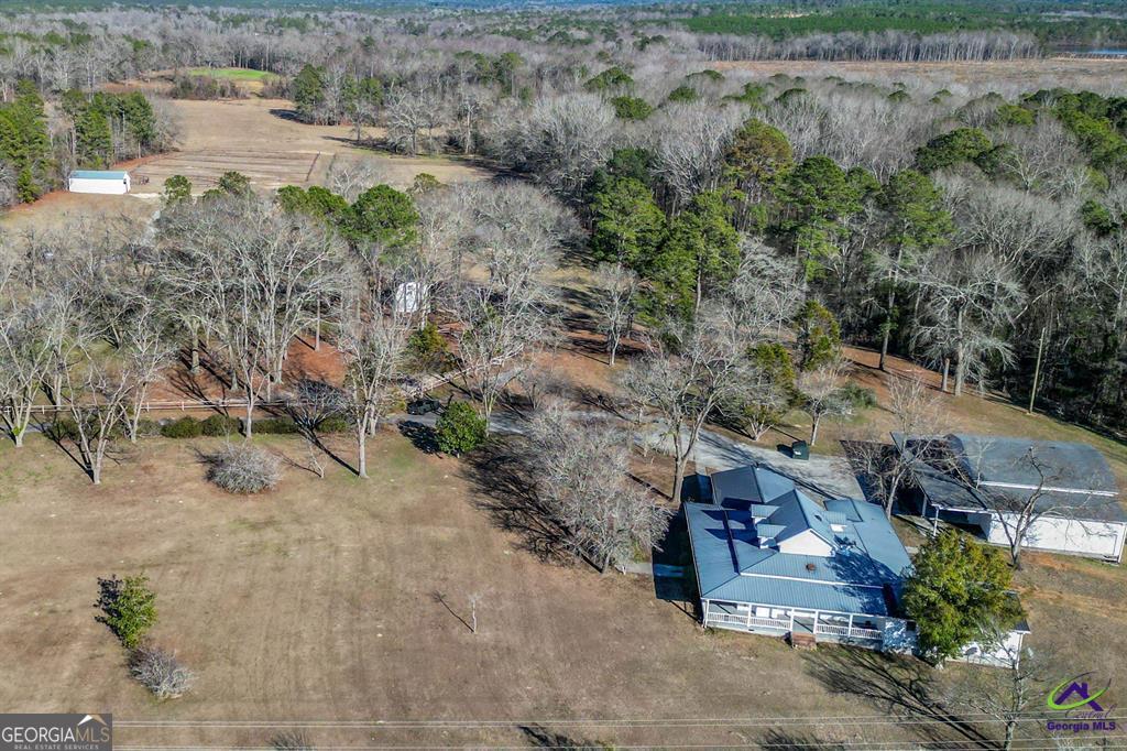 1441 Zenith Mill Road Roberta, GA 31078 - Photo 17 of 80 an aerial view of a house with a yard and mountain