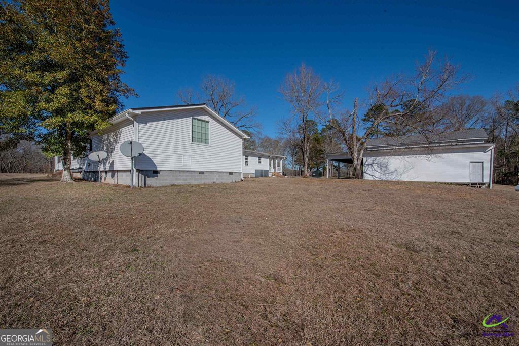 1441 Zenith Mill Road Roberta, GA 31078 - Photo 24 of 80 a view of a house with a yard