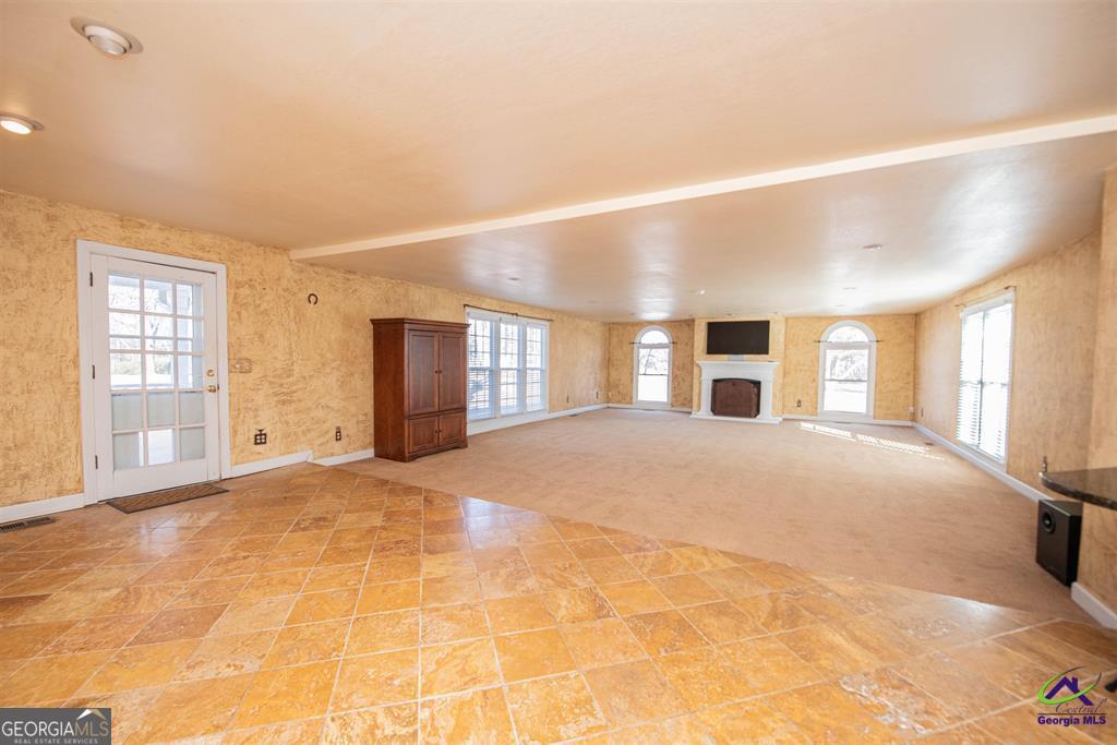 1441 Zenith Mill Road Roberta, GA 31078 - Photo 29 of 80 a view of a livingroom with a staircase