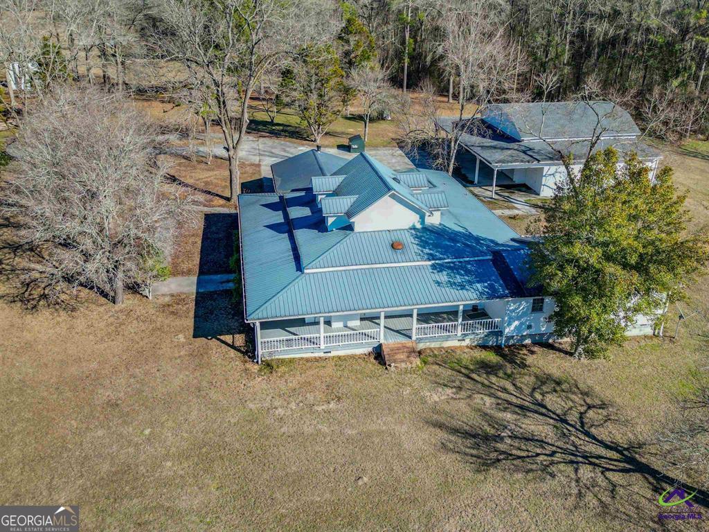 1441 Zenith Mill Road Roberta, GA 31078 - Photo 3 of 80 an aerial view of a house with a yard basket ball court and outdoor seating