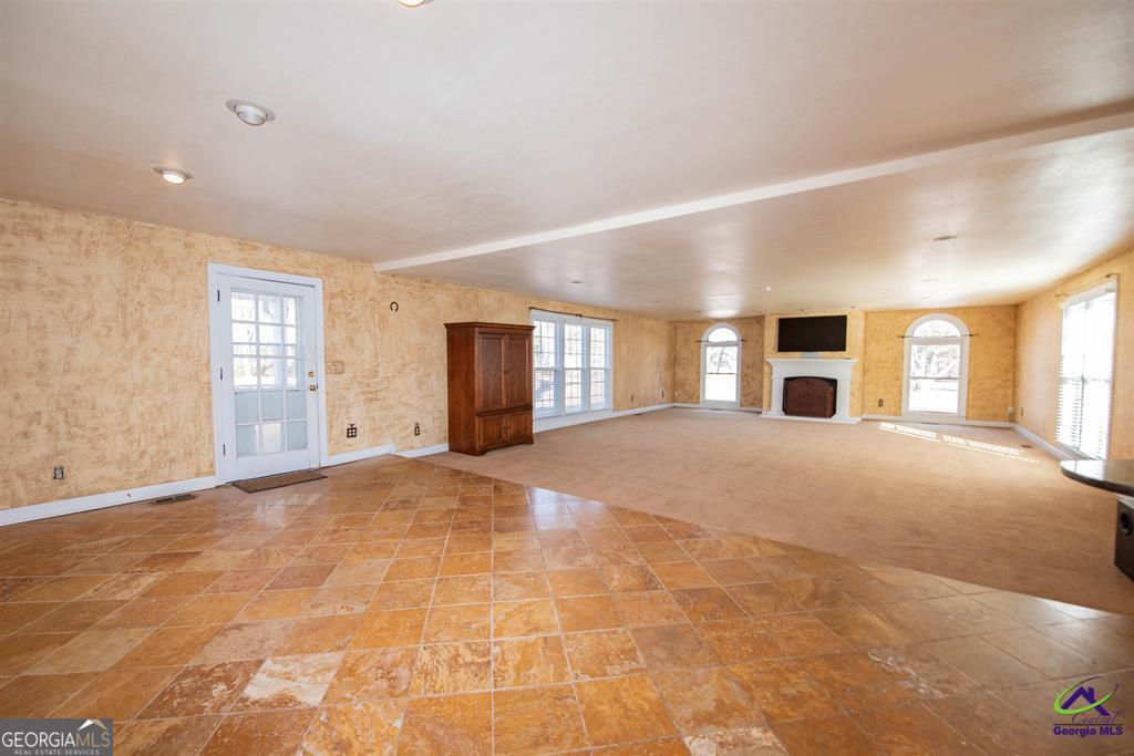 1441 Zenith Mill Road Roberta, GA 31078 - Photo 38 of 80 a view of empty room with windows and entryway