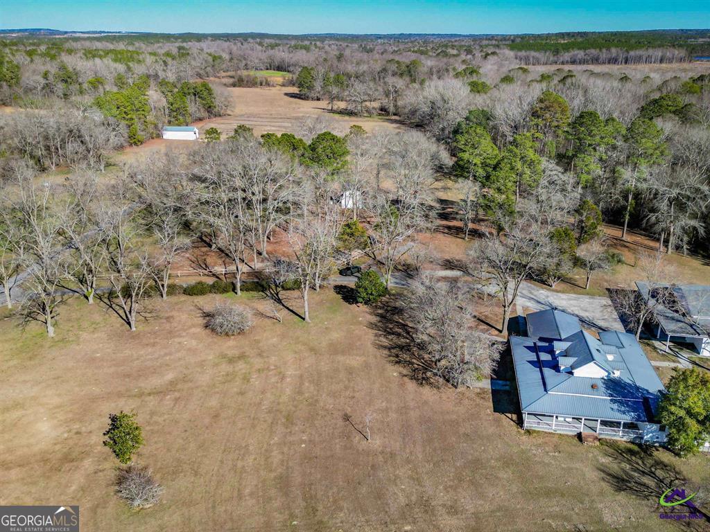 1441 Zenith Mill Road Roberta, GA 31078 - Photo 5 of 80 a view of a yard with wooden fence