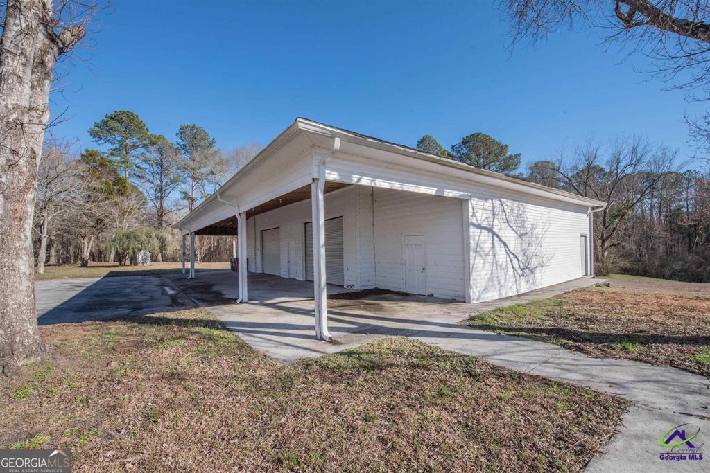 1441 Zenith Mill Road Roberta, GA 31078 - Photo 74 of 80 a front view of a house with a yard