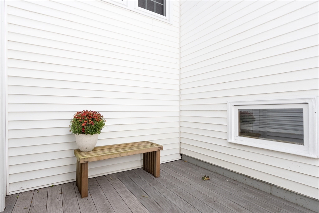 170 West Street, Unit 170 Needham, MA 02494 - Photo 26 of 32 a view of a bench in wooden floor