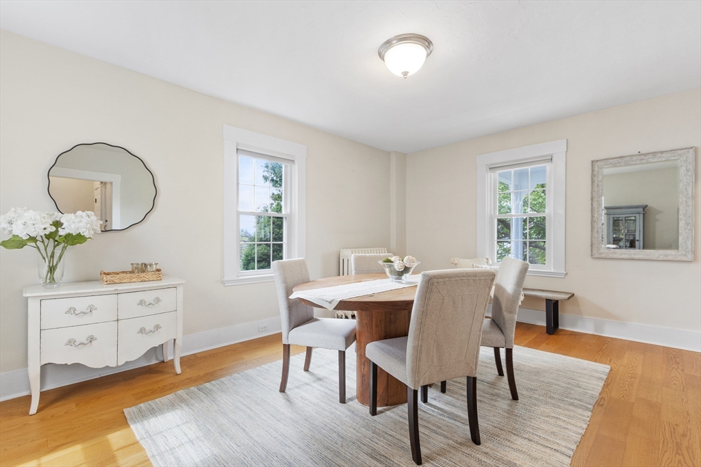 170 West Street, Unit 170 Needham, MA 02494 - Photo 5 of 32 a view of a dining room with furniture and wooden floor